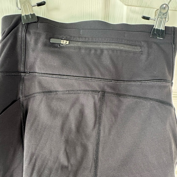 Lululemon Black Capri Reflective Mesh Pockets Size 4 Womens Running - Picture 7 of 8